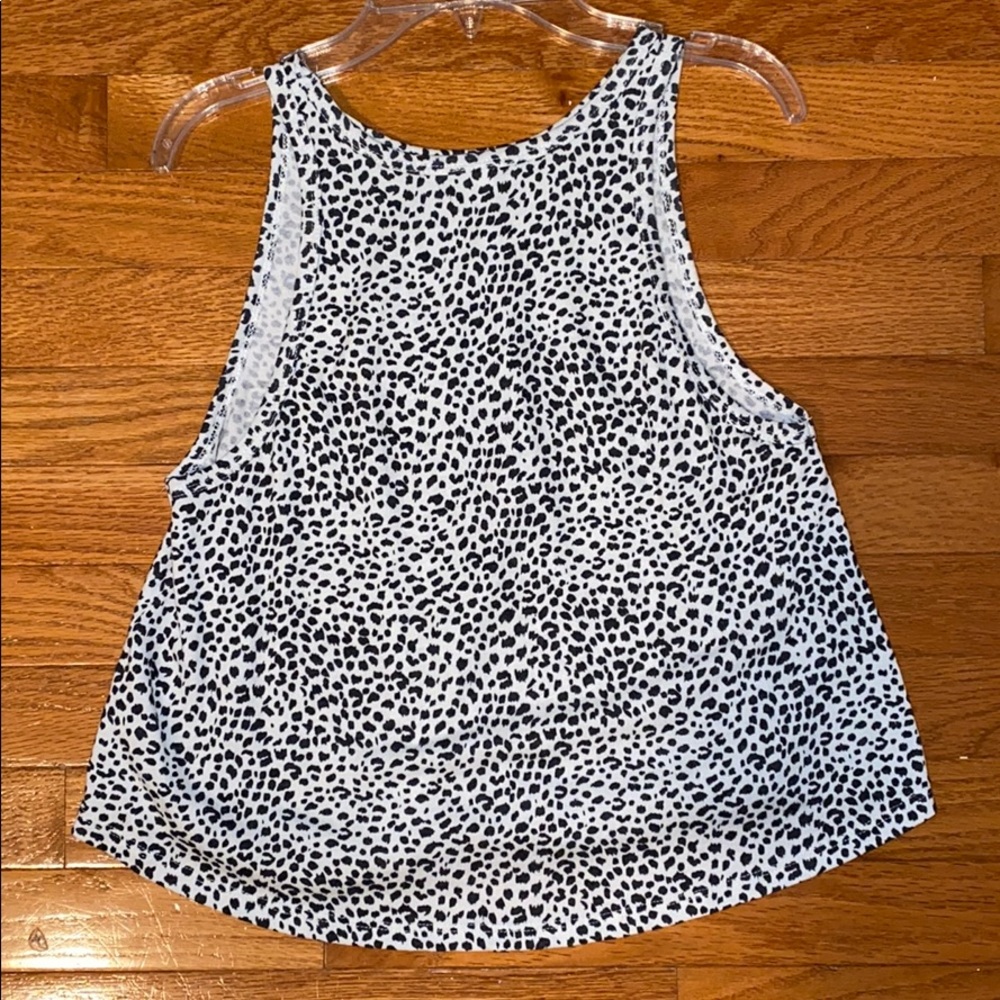 White and black patterned tank